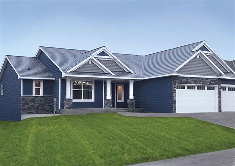 blue metal roof houses|houses with blue shingle roofs.